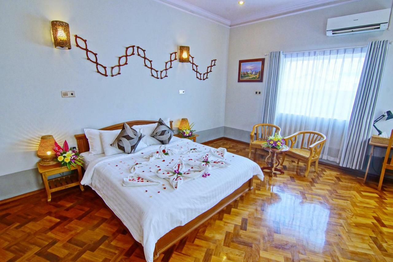 Triumph Hotel Mandalaj Kültér fotó